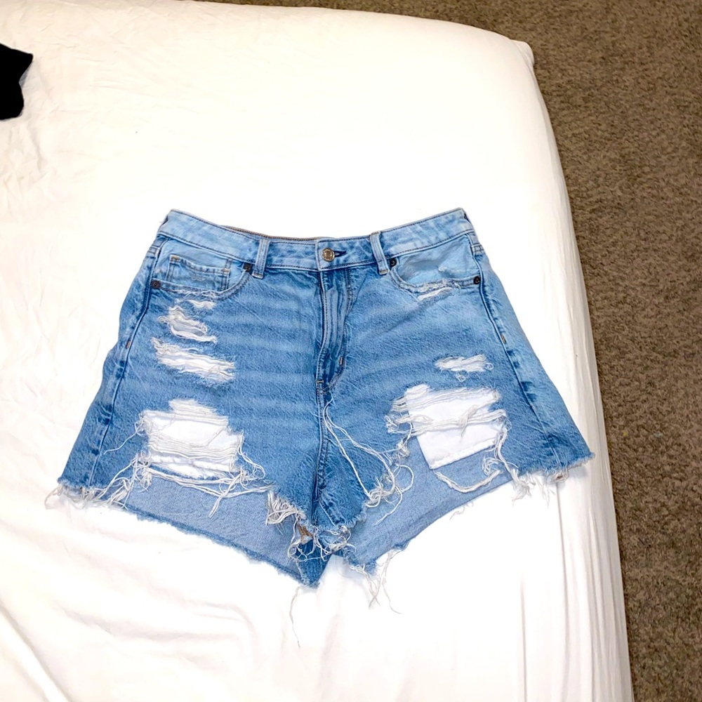 Light blue Jean ripped American eagle shorts